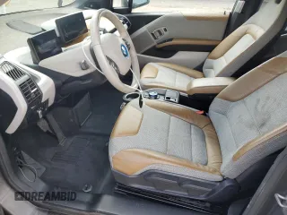 2014 BMW i3 z VIN WBY1Z2C5XEVX51161, wystawiony jako Copart lot #55044855 z przebiegiem 71 232 mil mil oraz Czysty tytuł • Clean title. Historia ofert i sprzedaży dostępna na DreamBid. Obrazek 7.