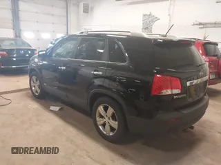 2012 Kia Sorento EX with VIN 5XYKUDA67CG306585, listed as a IAAI auction lot 42150969 with 128,792 mi miles. Bid and sale history available at carsss.com. Image 3.