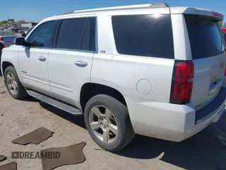 2016 Chevrolet Tahoe LTZ with VIN 1GNSCCKC1GR404754, listed as a IAAI auction lot 41831879 with 139,681 mi miles and . Bid and sale history available at DreamBid. Image 3.