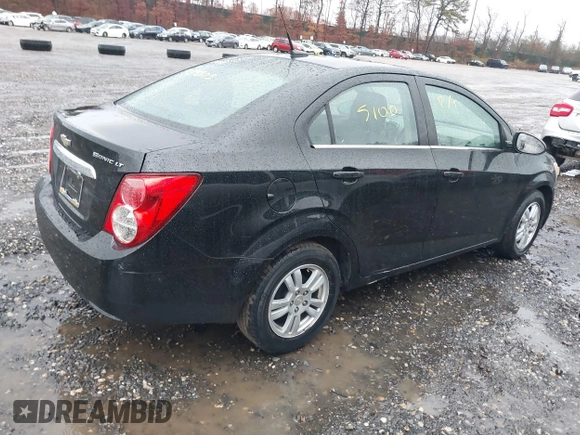 2012 Chevrolet Sonic LT z VIN 1G1JC5SH2C4201478, wystawiony jako IAAI lot #40933718 z przebiegiem 140 077 mil mil oraz . Historia ofert i sprzedaży dostępna na DreamBid. Obrazek 4.