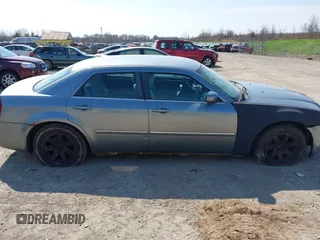 2007 Chrysler 300 Limited with VIN 2C3KA53G37H799150, listed as a IAAI auction lot 42104081 with 132,326 mi miles. Bid and sale history available at carsss.com. Image 6.