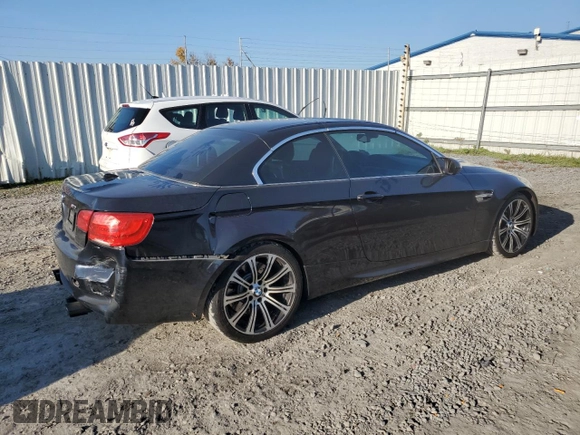 2013 BMW M3 with VIN WBSDX9C58DE785751, listed as a Copart auction lot 77334634 with 77,419 mi miles and Salvage Title. Bid and sale history available at carsss.com. Image 3.