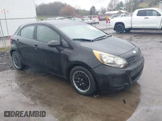 2013 Kia Rio LX with VIN KNADM5A35D6224764, listed as a IAAI auction lot 42004548 with 103,582 mi miles. Bid and sale history available at carsss.com. Image 1.