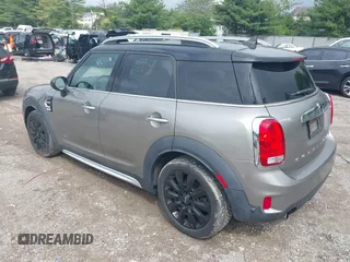 2018 MINI Countryman Cooper z VIN WMZYV5C39J3E02982, wystawiony jako IAAI lot #42384795 z przebiegiem 74 599 mil mil oraz . Historia ofert i sprzedaży dostępna na DreamBid. Obrazek 3.