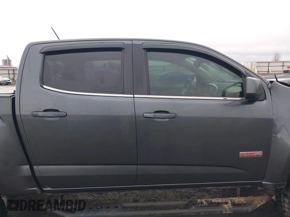 2016 GMC Canyon 4WD SLE with VIN 1GTG6CE37G1282630, listed as a IAAI auction lot 41153472 with 57,809 mi miles. Bid and sale history available at carsss.com. Image 13.
