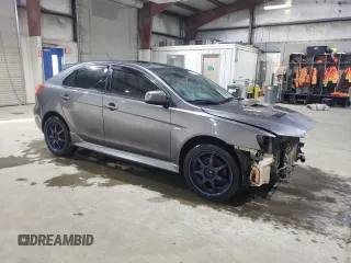2011 Mitsubishi Lancer with VIN JA32Y6HVXBU601253, listed as a Copart auction lot 79090934 with 147,823 mi miles and Salvage Title. Bid and sale history available at DreamBid. Image 4.