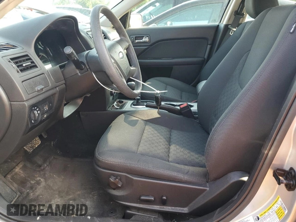2012 Ford Fusion SE z VIN 3FAHP0HA8CR432289, wystawiony jako Copart lot #58714925 z przebiegiem 59 201 mil mil oraz Szkoda całkowita • Salvage title. Historia ofert i sprzedaży dostępna na DreamBid. Obrazek 7.