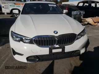 2020 BMW 3 Series 330i with VIN WBA5R1C02LFH48666, listed as a Copart auction lot 67959402 with 57,074 mi miles. Bid and sale history available at carsss.com. Image 5.