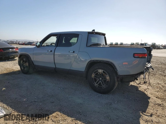 2022 Rivian R1T Adventure z VIN 7FCTGAAA0NN010103, wystawiony jako Copart lot #53312035 z przebiegiem 48 333 mil mil oraz Szkody całkowita. Historia ofert i sprzedaży dostępna na DreamBid. Obrazek 2.