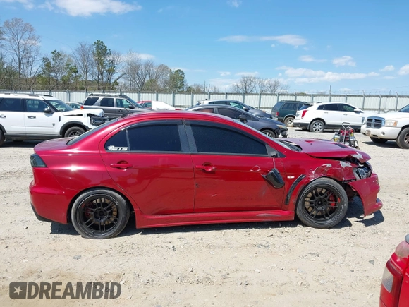 2008 Mitsubishi Lancer Evolution GSR with VIN JA3AW86V38U050561, listed as a IAAI auction lot 41879629 with 104,905 mi miles. Bid and sale history available at carsss.com. Image 13.