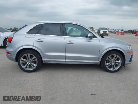 2018 Audi Q3 Premium Plus z VIN WA1JCCFS8JR023281, wystawiony jako IAAI lot #42071289 z przebiegiem 71 335 mil mil oraz . Historia ofert i sprzedaży dostępna na DreamBid. Obrazek 14.