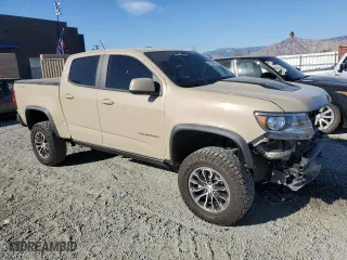 2022 Chevrolet Colorado 4WD ZR2 with VIN 1GCGTEEN4N1271054, listed as a Copart auction lot 87038104 with 13,697 mi miles and Salvage Title. Bid and sale history available at carsss.com. Image 4.