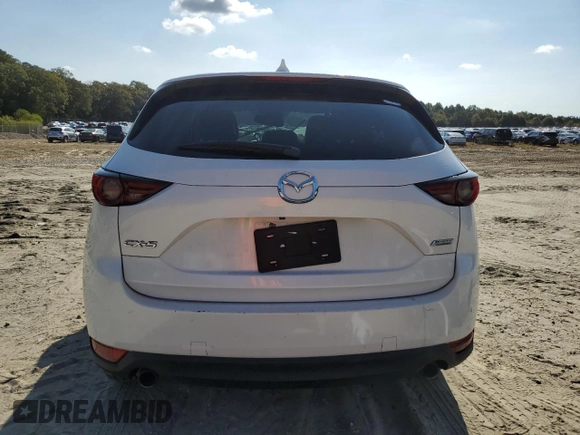 2018 Mazda CX-5 Grand Touring with VIN JM3KFADM9J1439436, listed as a Copart auction lot 74189114 with 0 mi miles and Salvage Title. Bid and sale history available at carsss.com. Image 6.