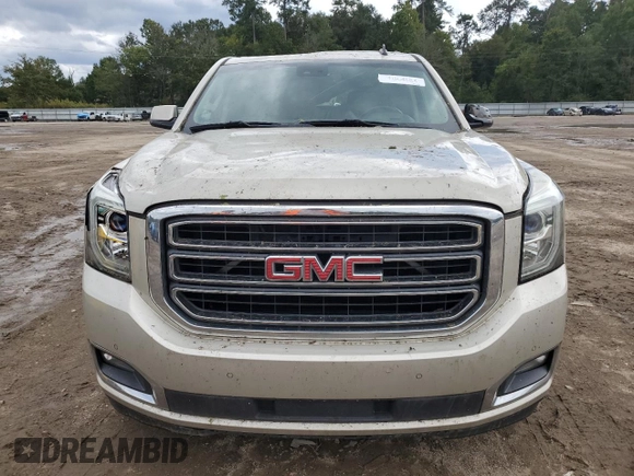 2015 GMC Yukon XL SLT with VIN 1GKS1HKC5FR168608, listed as a Copart auction lot 71564384 with 197,538 mi miles and Salvage Title. Bid and sale history available at carsss.com. Image 5.