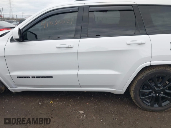 2018 Jeep Grand Cherokee Altitude with VIN 1C4RJFAG2JC284301, listed as a IAAI auction lot 41832657 with 97,160 mi miles and . Bid and sale history available at DreamBid. Image 14.