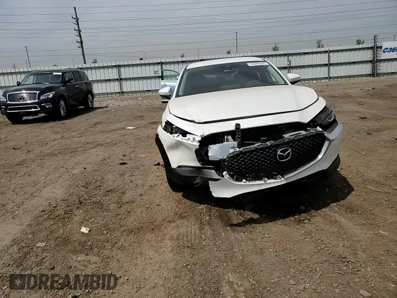 2023 Mazda CX-30 S with VIN 3MVDMBAMXPM586909, listed as a Copart auction lot 55889535 with 21,057 mi miles and Salvage title. Bid and sale history available at DreamBid. Image 13.