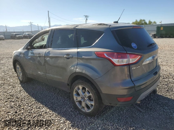 2014 Ford Escape Titanium with VIN 1FMCU9J90EUD94405, listed as a Copart auction lot 68489754 with 52,045 mi miles and Salvage Title. Bid and sale history available at DreamBid. Image 2.
