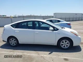 2008 Toyota Prius z VIN JTDKB20U183323310, wystawiony jako IAAI lot #42433329 z przebiegiem 140 100 mil mil oraz . Historia ofert i sprzedaży dostępna na DreamBid. Obrazek 13.