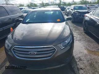 2015 Ford Taurus SEL with VIN 1FAHP2E87FG194170, listed as a IAAI auction lot 42184749 with 222,609 mi miles and . Bid and sale history available at carsss.com. Image 12.