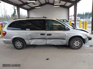 2005 Dodge Caravan SE with VIN 1D4GP24R85B351591, listed as a IAAI auction lot 41949337 with 130,821 mi miles. Bid and sale history available at carsss.com. Image 14.