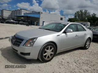 2009 Cadillac CTS RWD w/1SA with VIN 1G6DF577690145964, listed as a Copart auction lot 74073064 with 103,788 mi miles and Salvage Title. Bid and sale history available at carsss.com. Image 1.