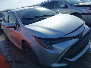 2019 Toyota Corolla Hatchback SE with VIN JTNK4RBE8K3066254, listed as a IAAI auction lot 41668885 with 57,885 mi miles. Bid and sale history available at carsss.com. Image 1.