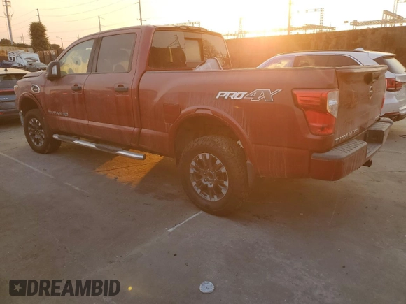 2016 Nissan Titan SL with VIN 1N6BA1F46GN516606, listed as a Copart auction lot 54073565 with 38,097 mi miles and Salvage title. Bid and sale history available at DreamBid. Image 2.