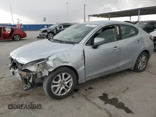 2018 Toyota Yaris with VIN 3MYDLBYV1JY327794, listed as a Copart auction lot 52025275 with 146,809 mi miles and Clean Title. Bid and sale history available at DreamBid. Image 1.