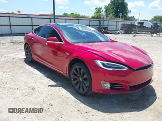 2016 Tesla Model S 90D with VIN 5YJSA1E48GF144821, listed as a IAAI auction lot 42206473 with 129,624 mi miles and . Bid and sale history available at DreamBid. Image 1.