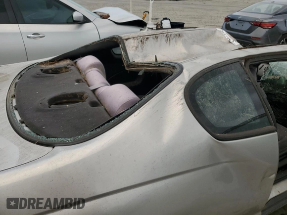 2006 Chevrolet Monte Carlo LS z VIN 2G1WJ15KX69247931, wystawiony jako Copart lot #57317285 z przebiegiem 165 525 mil mil oraz Nie do naprawy • Non repairable. Historia ofert i sprzedaży dostępna na DreamBid. Obrazek 10.