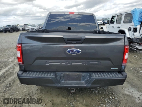 2018 Ford F-150 XL with VIN 1FTEW1CP7JKE15048, listed as a Copart auction lot 51328255 with 146,938 mi miles and Salvage Title. Bid and sale history available at carsss.com. Image 6.