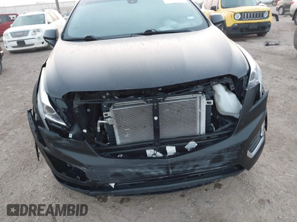 2019 Cadillac XT5 FWD with VIN 1GYKNARS7KZ206980, listed as a IAAI auction lot 41775661 with 54,628 mi miles and . Bid and sale history available at DreamBid. Image 6.