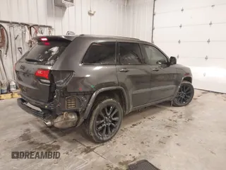 2018 Jeep Grand Cherokee Laredo E with VIN 1C4RJFAG6JC499261, listed as a IAAI auction lot 41033418 with 67,554 mi miles and . Bid and sale history available at DreamBid. Image 4.