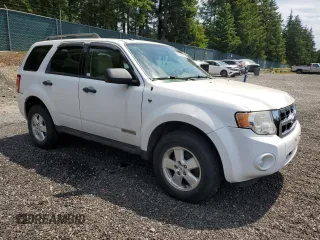 2008 Ford Escape XLT with VIN 1FMCU93108KA90367, listed as a Copart auction lot 60464585 with 205,566 mi miles and Clean title. Bid and sale history available at DreamBid. Image 4.