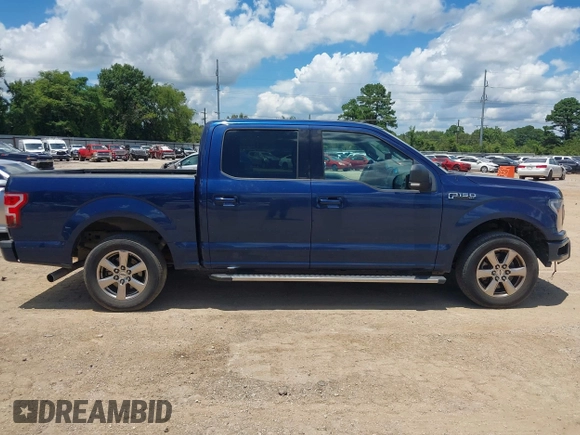 2018 Ford F-150 XL with VIN 1FTEW1CP9JKC48708, listed as a IAAI auction lot 42625137 with 209,479 mi miles and . Bid and sale history available at DreamBid. Image 13.