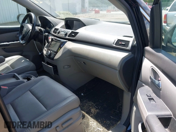 2014 Honda Odyssey EX-L with VIN 5FNRL5H66EB062158, listed as a IAAI auction lot 42072020 with 211,278 mi miles and . Bid and sale history available at carsss.com. Image 5.