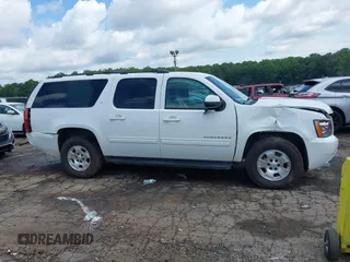 2014 Chevrolet Suburban LT with VIN 1GNSCJE07ER211222, listed as a IAAI auction lot 42428084 with 214,712 mi miles and . Bid and sale history available at DreamBid. Image 6.