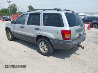 2004 Jeep Grand Cherokee Laredo with VIN 1J4GW48N94C420407, listed as a IAAI auction lot 42689372 with 217,768 mi miles and . Bid and sale history available at DreamBid. Image 3.