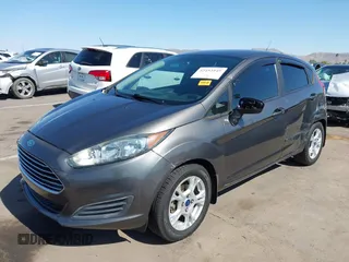 2015 Ford Fiesta SE z VIN 3FADP4EJ0FM146237, wystawiony jako IAAI lot #42452345 z przebiegiem 121 742 mil mil oraz . Historia ofert i sprzedaży dostępna na DreamBid. Obrazek 2.