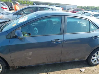 2016 Toyota Corolla L z VIN 5YFBURHE7GP481995, wystawiony jako IAAI lot #42471078 z przebiegiem 51 245 mil mil oraz . Historia ofert i sprzedaży dostępna na DreamBid. Obrazek 14.