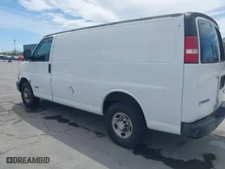 2005 Chevrolet Express Cargo Van with VIN 1GCHG35U651127686, listed as a IAAI auction lot 42028915 with 357,912 mi miles. Bid and sale history available at carsss.com. Image 3.
