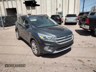 2017 Ford Escape Titanium with VIN 1FMCU9JD0HUC09357, listed as a Copart auction lot 52772915 with 99,062 mi miles and Clean Title. Bid and sale history available at carsss.com. Image 1.