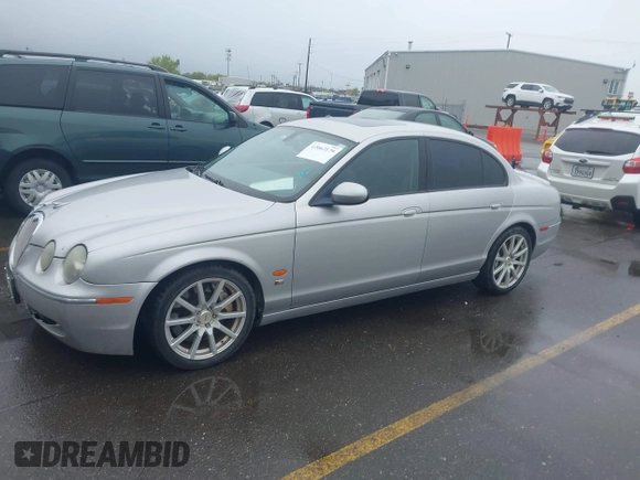 2005 Jaguar S-Type with VIN SAJWA03V451N24124, listed as a IAAI auction lot 42062179 with 286,268 mi miles and . Bid and sale history available at DreamBid. Image 2.