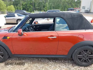 2011 MINI Convertible with VIN WMWZN3C57BTZ89303, listed as a IAAI auction lot 42352242 with 146,448 mi miles and . Bid and sale history available at DreamBid. Image 14.