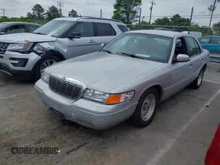 2001 Mercury Grand Marquis LS z VIN 2MEFM75W91X655747, wystawiony jako IAAI lot #42041090 z przebiegiem 138 906 mil mil oraz . Historia ofert i sprzedaży dostępna na DreamBid. Obrazek 2.