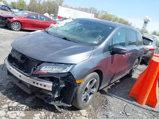 2018 Honda Odyssey Touring with VIN 5FNRL6H8XJB029570, listed as a IAAI auction lot 41485794 with 77,601 mi miles. Bid and sale history available at carsss.com. Image 17.