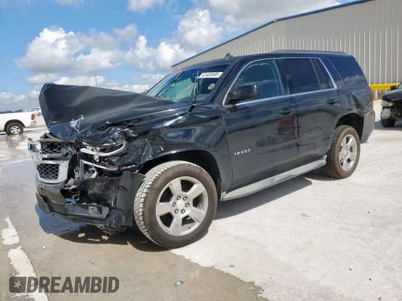 2015 Chevrolet Tahoe LT with VIN 1GNSCBKC1FR136202, listed as a Copart auction lot 62408595 with 117,869 mi miles and Salvage title. Bid and sale history available at DreamBid. Image 1.