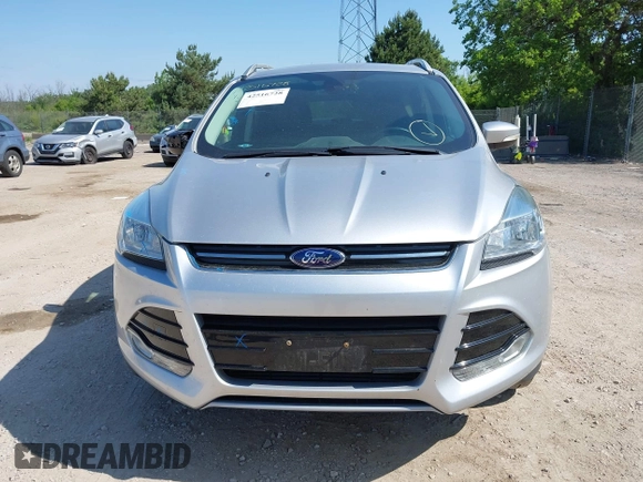 2015 Ford Escape Titanium with VIN 1FMCU9J94FUA65188, listed as a IAAI auction lot 42516728 with 65,969 mi miles and . Bid and sale history available at DreamBid. Image 12.
