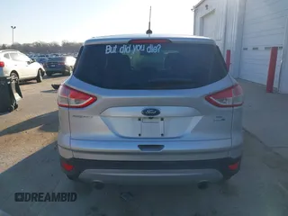 2016 Ford Escape SE with VIN 1FMCU9GX0GUA13421, listed as a IAAI auction lot 41788760 with 123,062 mi miles and . Bid and sale history available at DreamBid. Image 17.