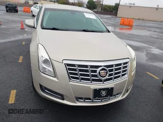 2013 Cadillac XTS z VIN 2G61N5S32D9127146, wystawiony jako IAAI lot #41578528 z przebiegiem 98 529 mil mil oraz . Historia ofert i sprzedaży dostępna na DreamBid. Obrazek 12.
